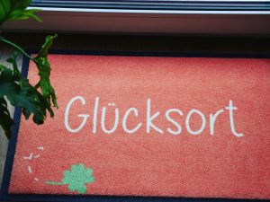 Glücksort Fußmatte Orange mit Kleeblatt